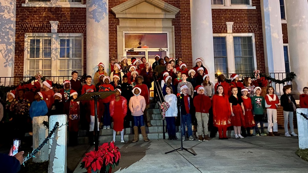 TCUES Children's Choir performs at Butler's Christmas Tree Lighting.